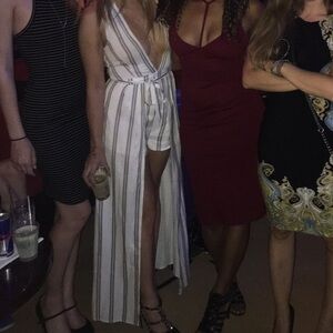 Vestique low cut open front romper.